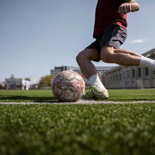 BUC-Facilities-side-view-man-playing-soccer